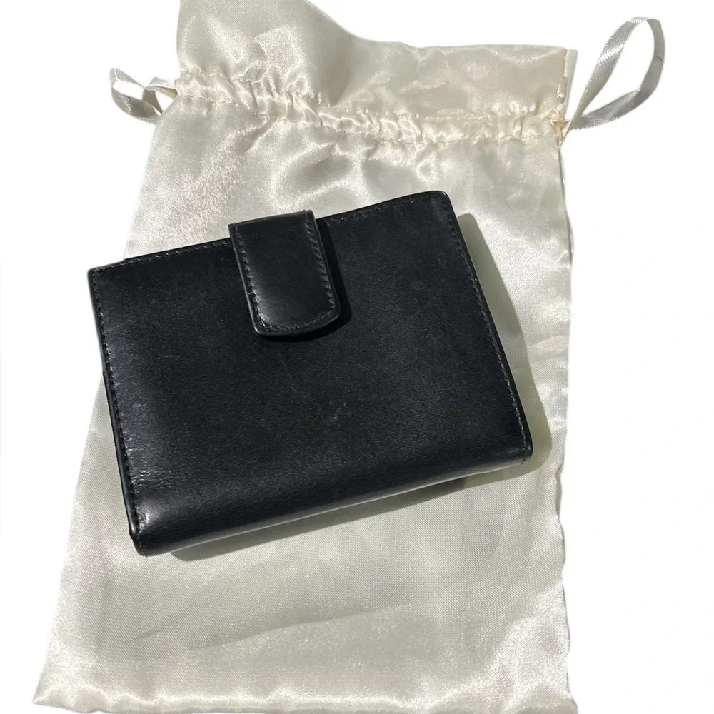 Authentic Ferragamo black leather trifold wallet gold with callouts
